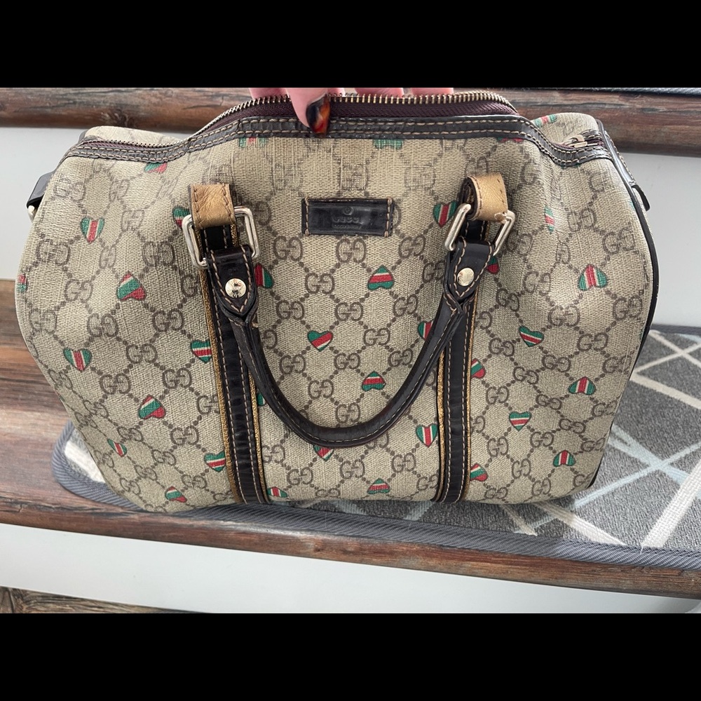 WELL loved Gucci bag. Authentic. Signs of wear.